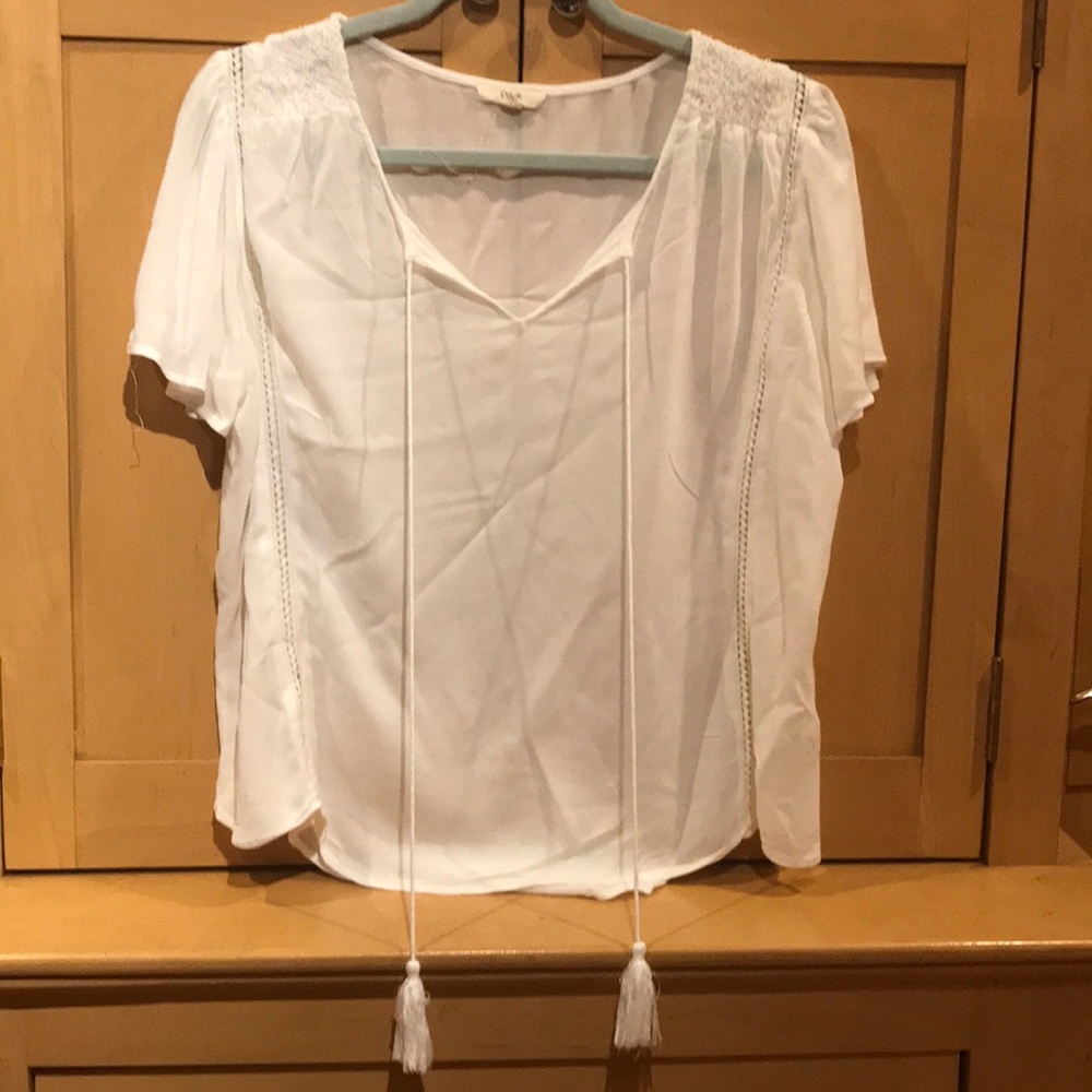 Sheer blouse with tassels